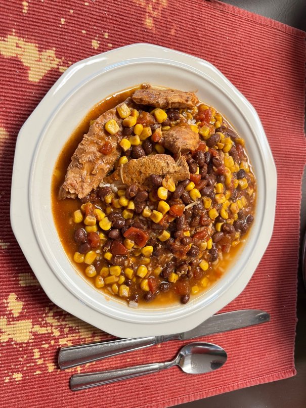 A zingy dish with chicken that can be best served over rice on noodles
